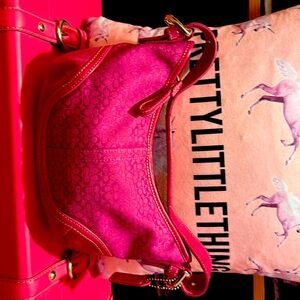 Cute just like new pick small cute coach bag for on the go.